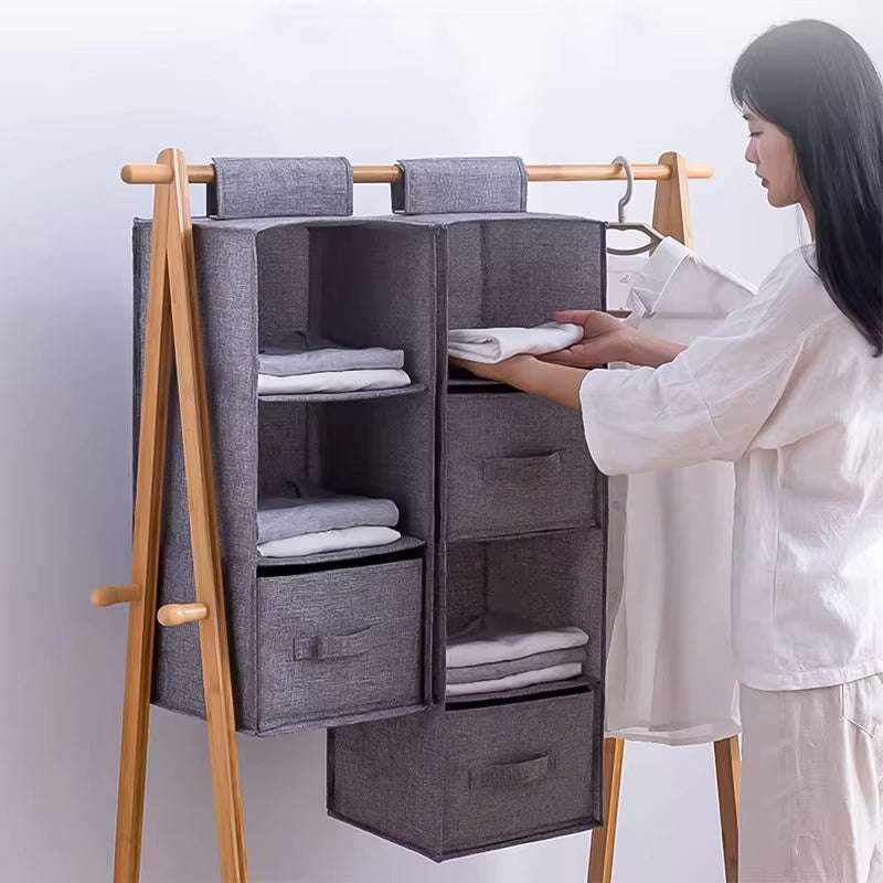 Drawer storage closet hanging bag made of cotton cloth with multiple layers.