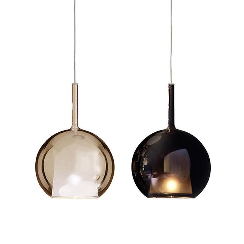 Nordic Creative Staircase Long Chandelier in amber and ash glass with modern design.