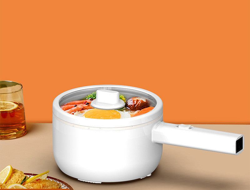 Multifunctional electric cooker with glass lid, cooking food on an orange background.