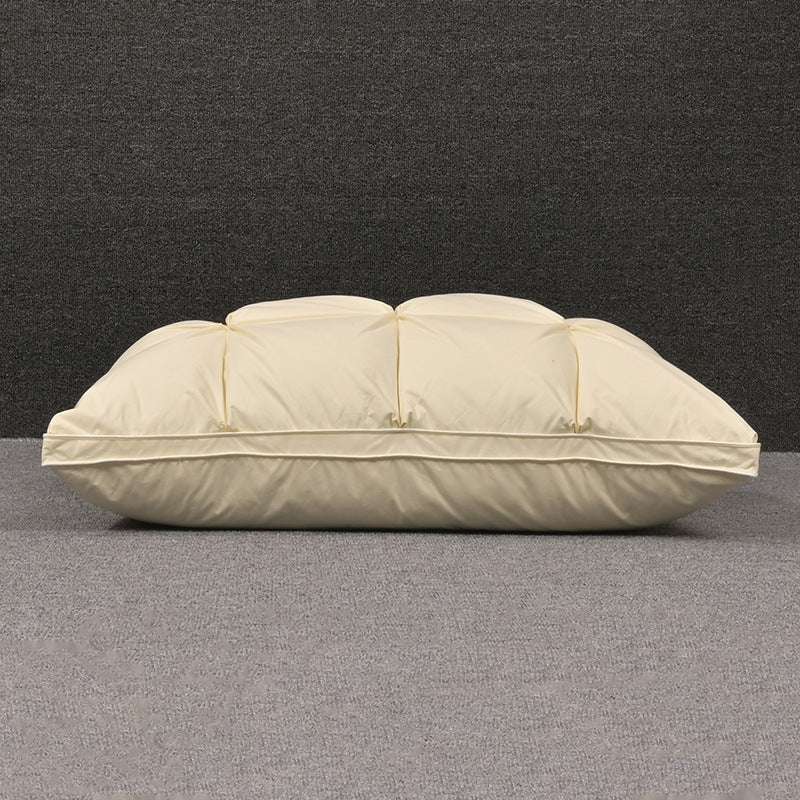 White goose down cotton pillow in rectangular shape, made for single use.