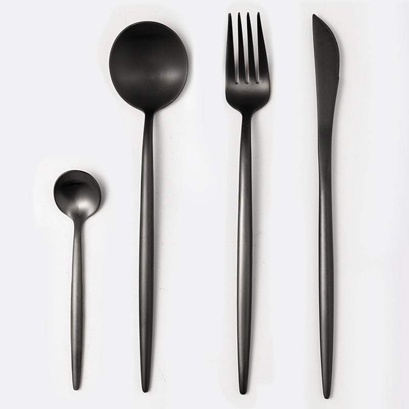 Stainless steel cutlery spoon set with mirror finish, including spoons, forks, knife, and chopsticks.