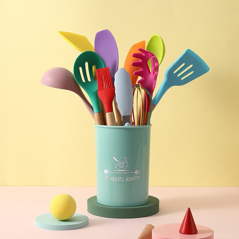 Wooden handle silicone kitchenware set in a colorful container.