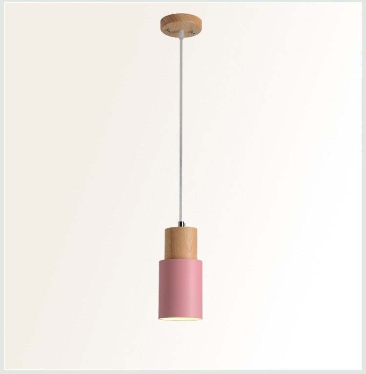 Macaron bedside chandelier with adjustable height and modern design.