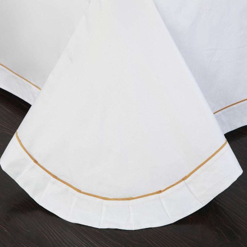 Four-piece cotton bedding set with simple style and plain pattern.