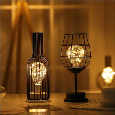Minimalist hollow table lamps with iron shell and soft warm LED lighting.