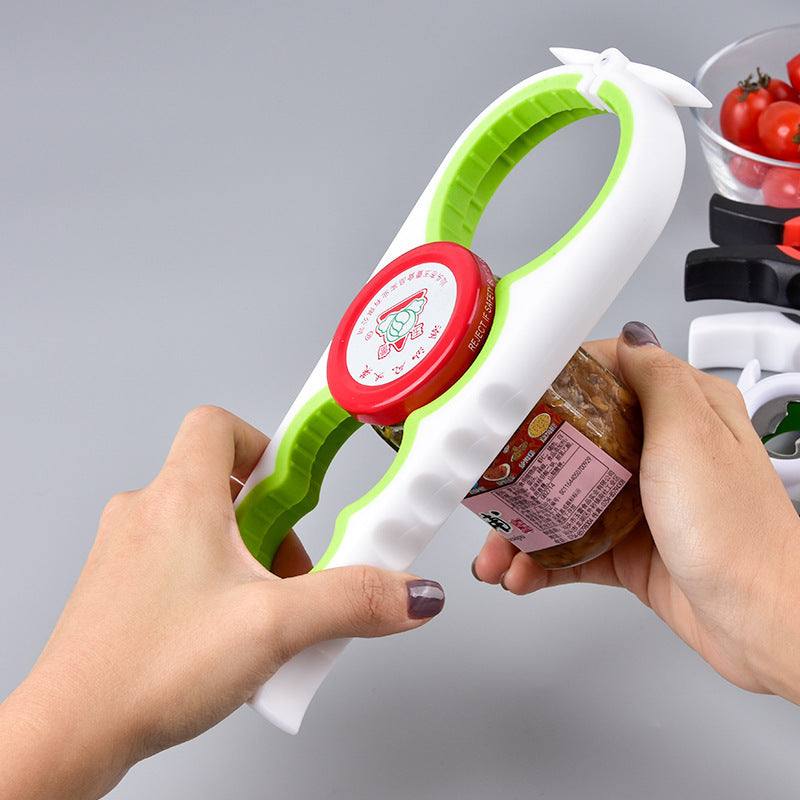 Modern kitchen home can opener in white and green, ergonomic ABS design in use.