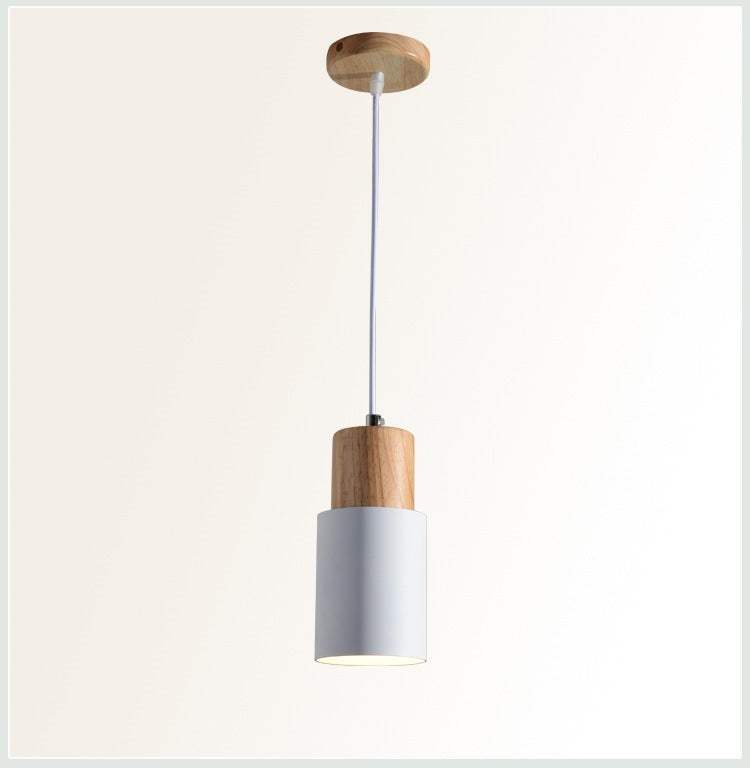 Macaron bedside chandelier with adjustable height and modern design.