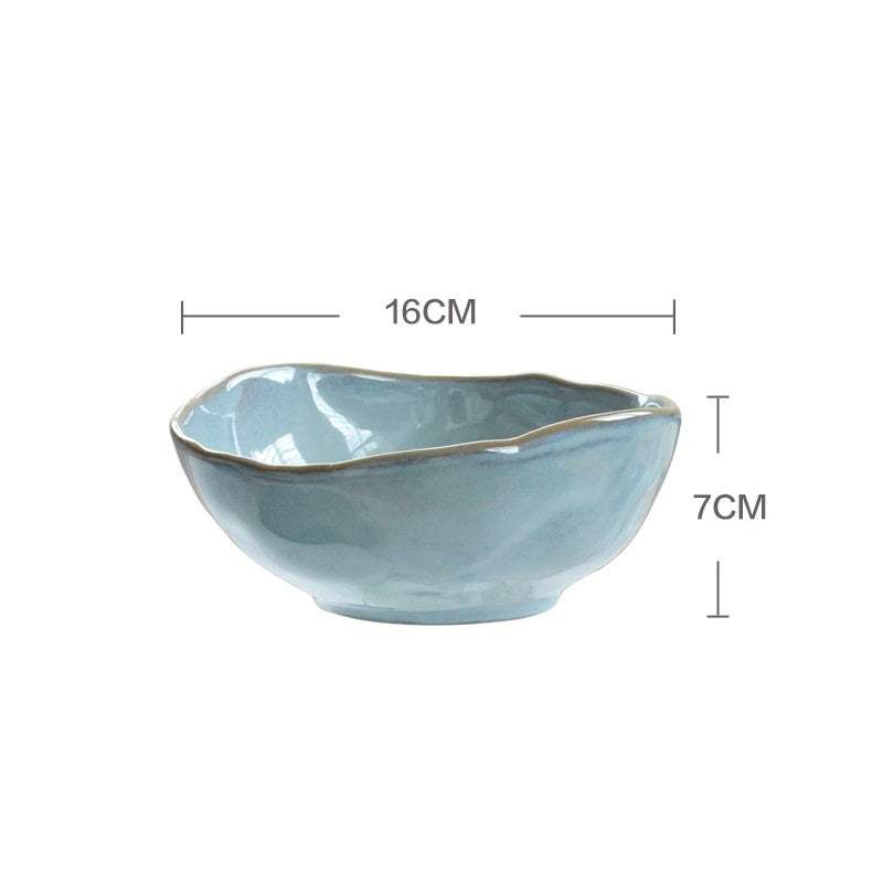 Nordic creative irregular ceramic bowl with blue kiln glaze, 16cm x 7cm.