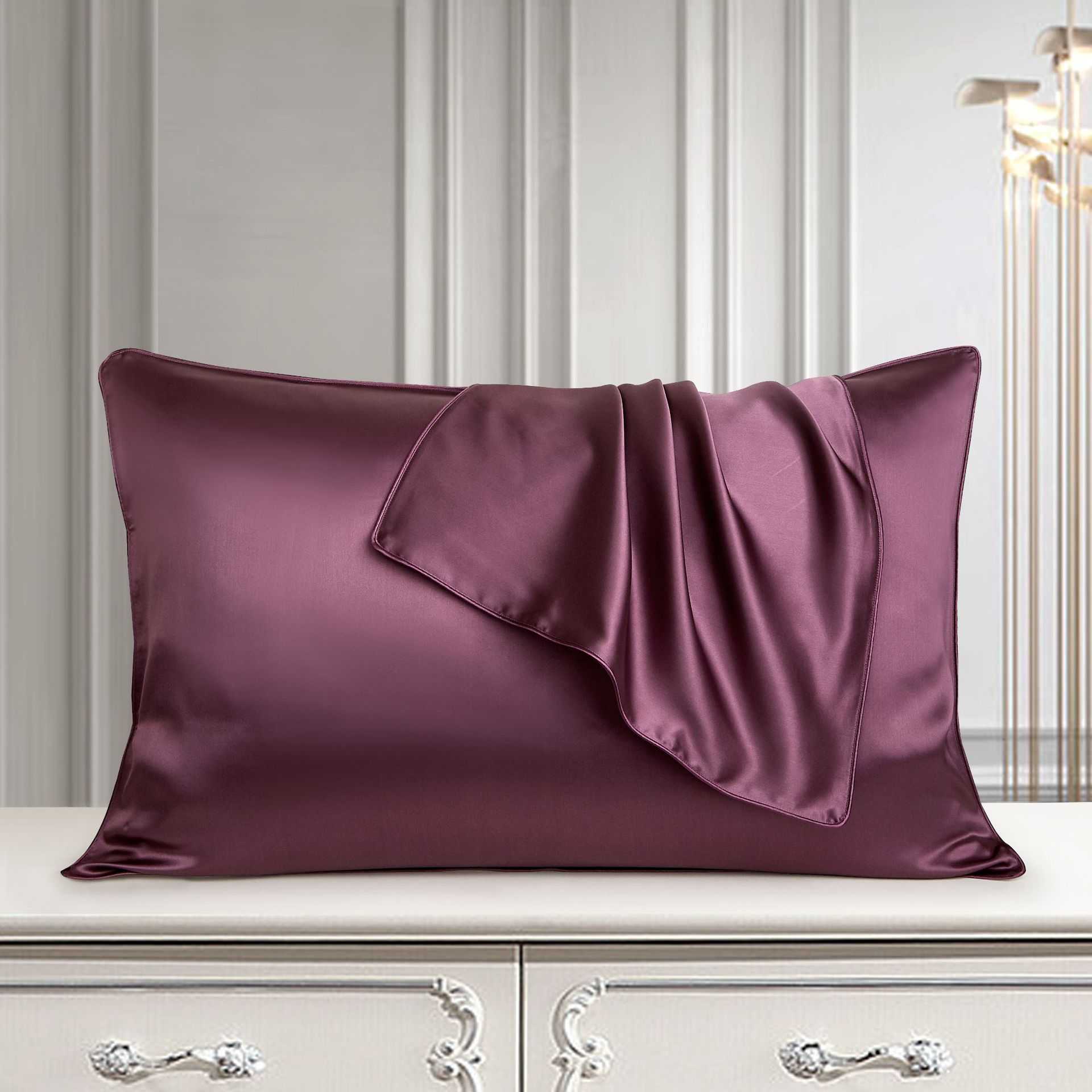 Mulberry silk pillow case in palace luxury style on elegant dresser.