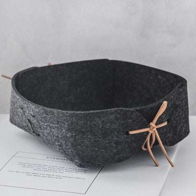 Mini wool felt storage basket, dark gray, handheld design, ideal for desktop jewelry or key storage.