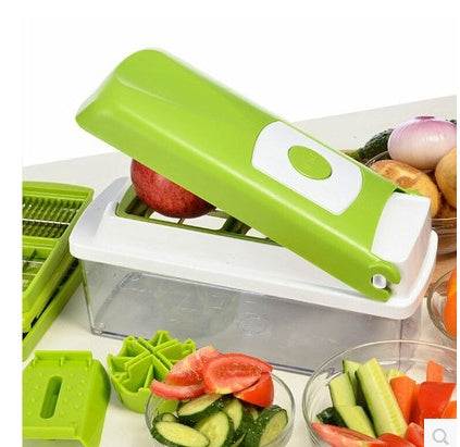Multifunctional vegetable chopper with green handle, various blades, and sliced vegetables.