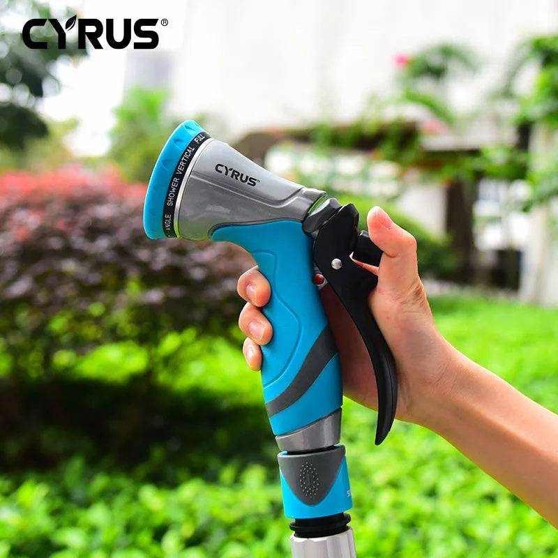 Garden sprayer water spray bottle with ergonomic handle being used outdoors.