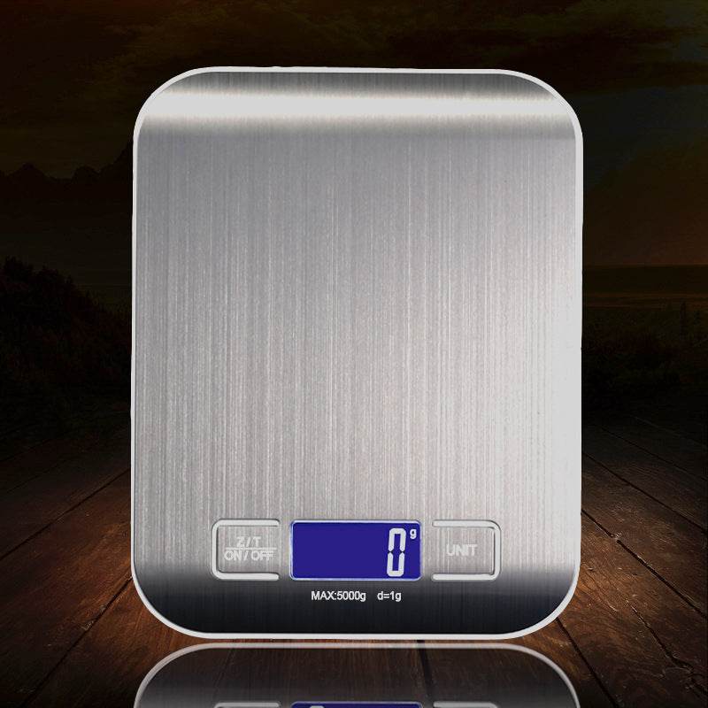 Rechargeable flat stainless steel kitchen scale with small platform, electronic scale for accurate measurements.