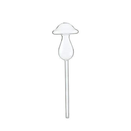 Glass automatic watering device for potted green plants.
