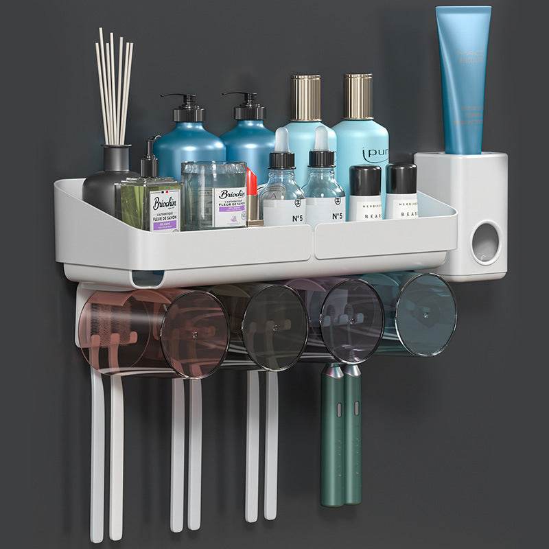 Toothbrush holder with suction cups, multiple compartments, and plastic material for organized daily necessities storage.