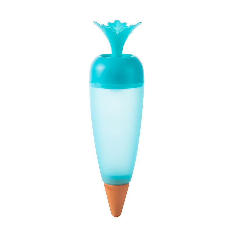 Plastic plant watering globe spike with terracotta tip for automatic soil hydration.
