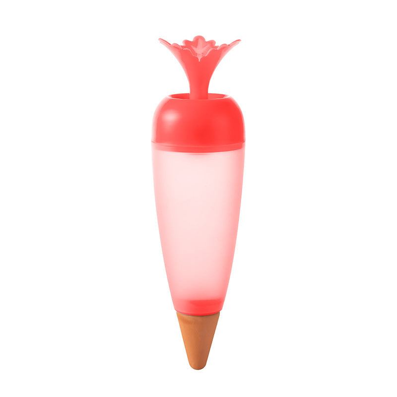 Plastic self-watering globe with terracotta spike for plants.