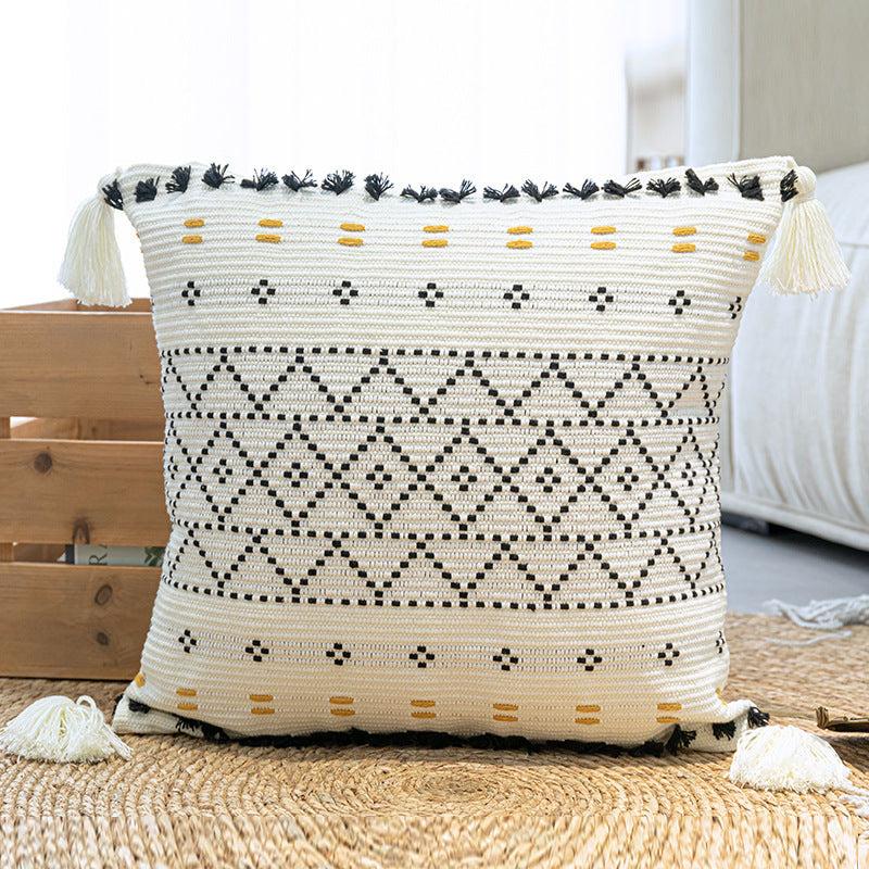 Nordic resort style geometric abstraction sofa bed pillow with tassels.
