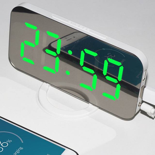 LED alarm clock with dual USB output and mirror display.
