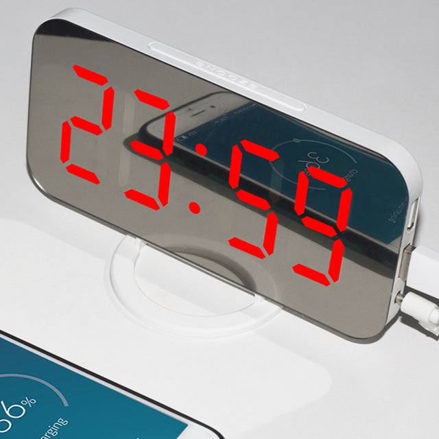 LED alarm clock with mirror display, dual USB output for mobile charging.
