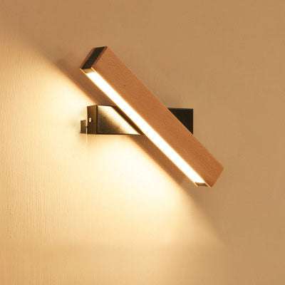 Wooden LED wall lamp with warm light, modern adjustable design.