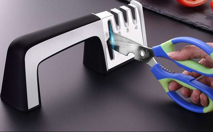 Fast knife sharpener with stainless steel and ABS plastic materials.