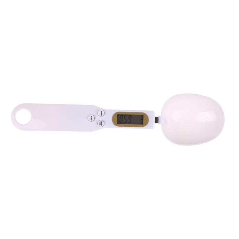 LCD Digital Kitchen Scale with measuring spoon and LCD display, ideal for precise cooking measurements.