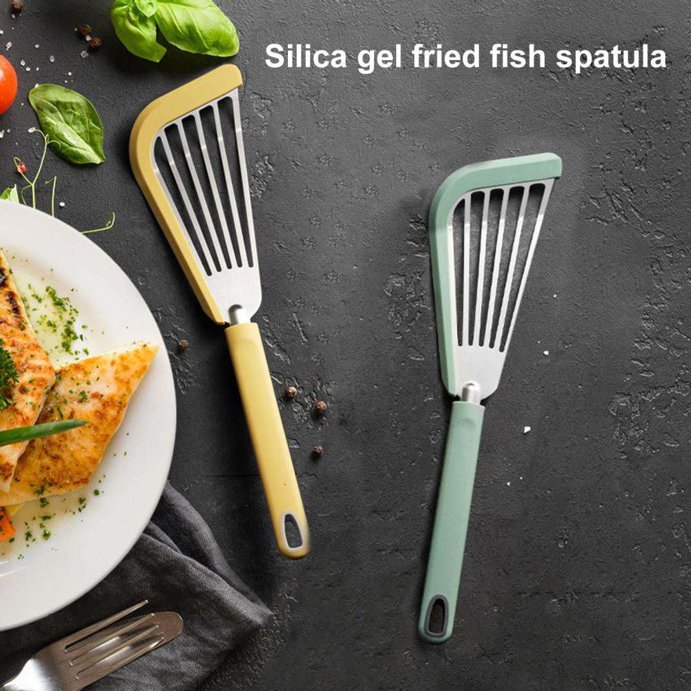 Nonstick fish spatula with thin slotted design, silicone turner for nonstick cookware, high heat resistant, ideal for delicate foods like fish and pancakes.