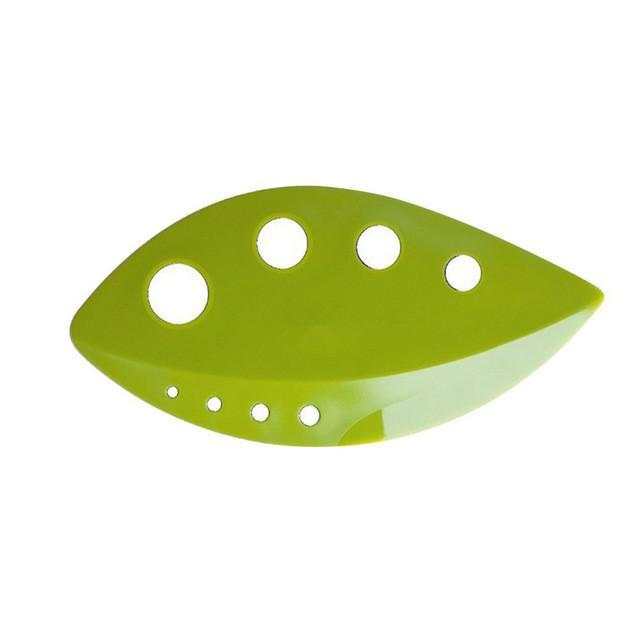 Green herb stripper leaf tool with multiple hole sizes for easy herb removal.