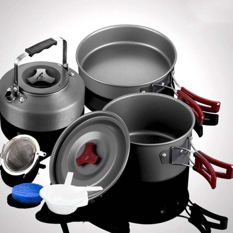 Picnic cookware set with pots and frying pan in hard alumina.