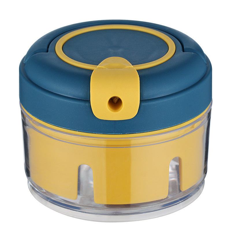 Stainless steel garlic press with ergonomic handle and non-slip design.