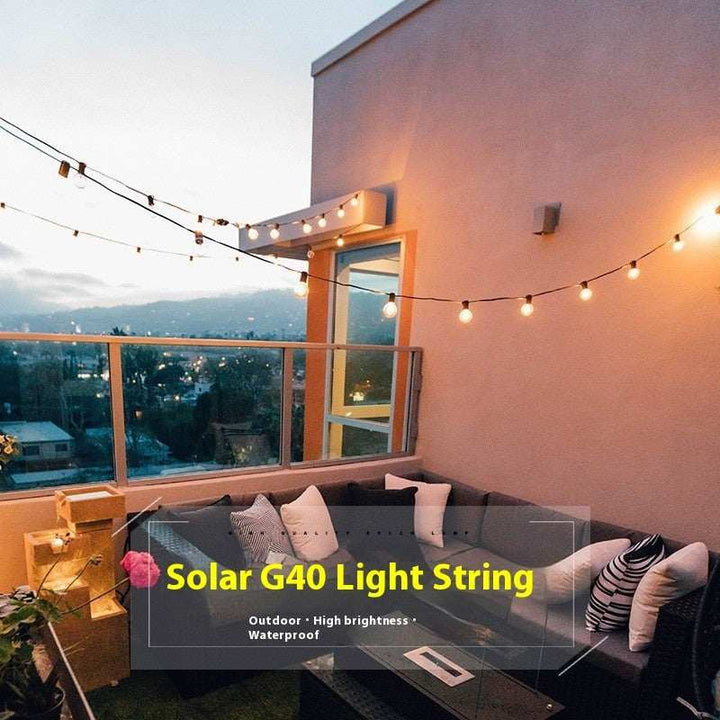 Solar G40 decorative string lights on an outdoor patio at dusk.
