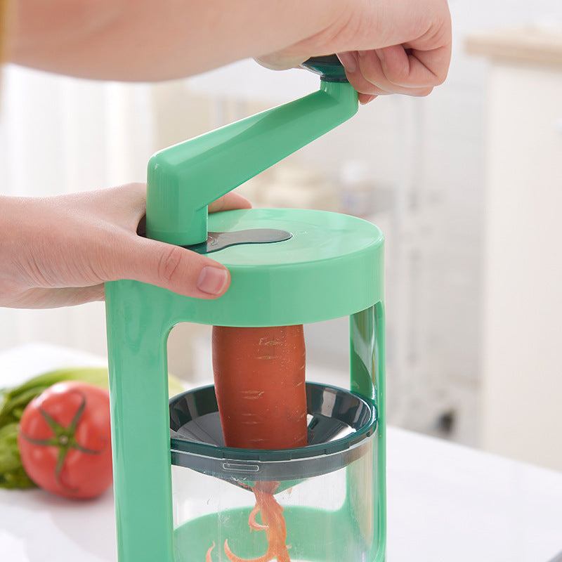 Multifunctional vegetable cutter in use with carrot.