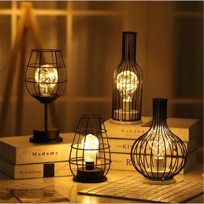 Minimalist hollow table lamps with creative iron design, ideal for bedroom and home decor.