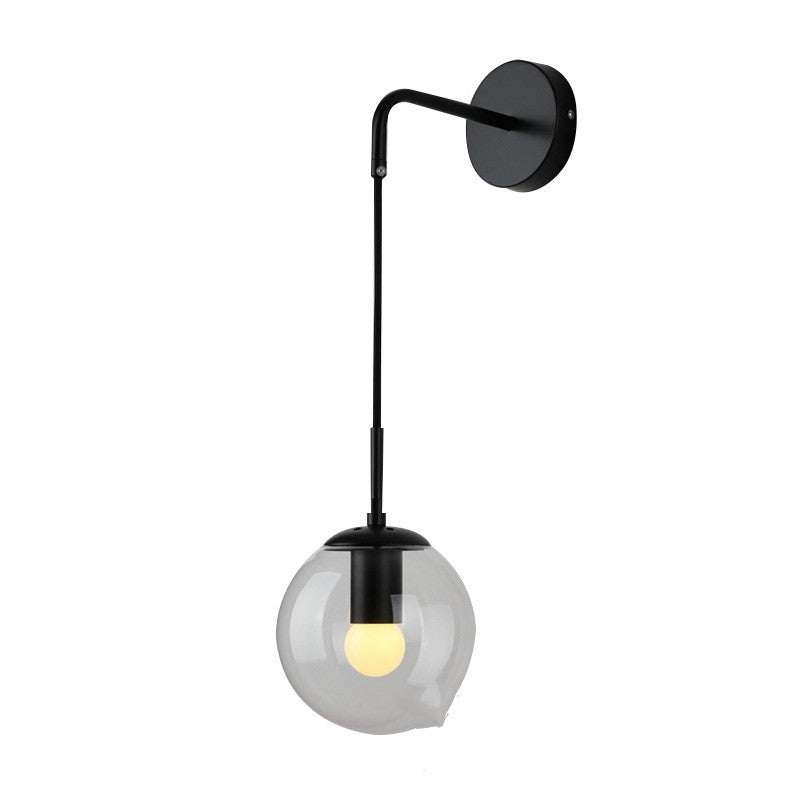 Nordic glass wall lamp with black light body, suitable for living room or bedroom.