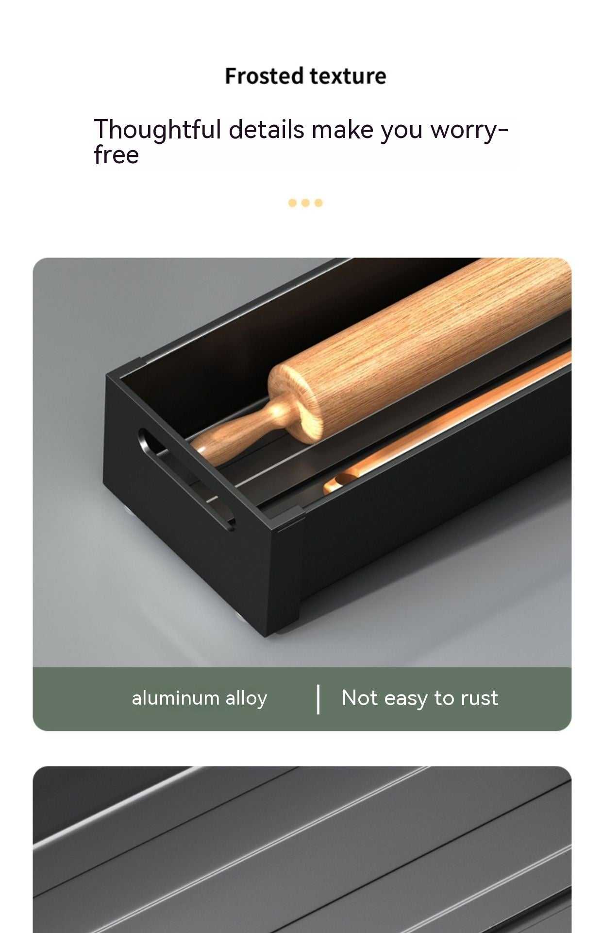 Aluminum kitchen drawer storage box with sleek, rust-resistant design, holding a rolling pin.