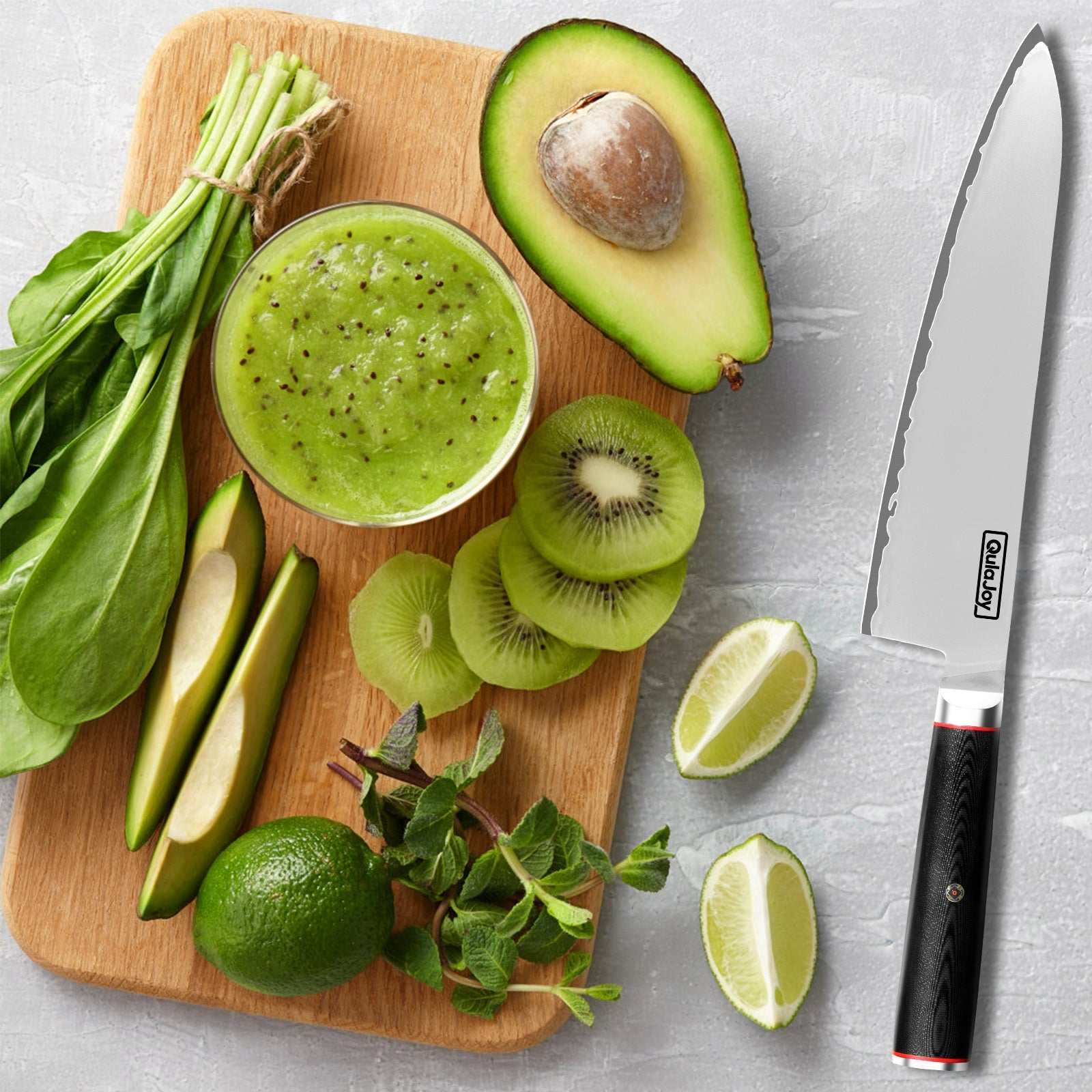 Qulajoy VG10 Chef Knife with 15° V-shaped blade on a cutting board with vegetables.