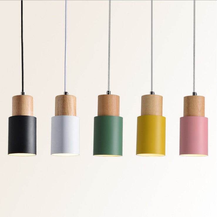 Modern Macaron bedside chandeliers with adjustable height in various colors.