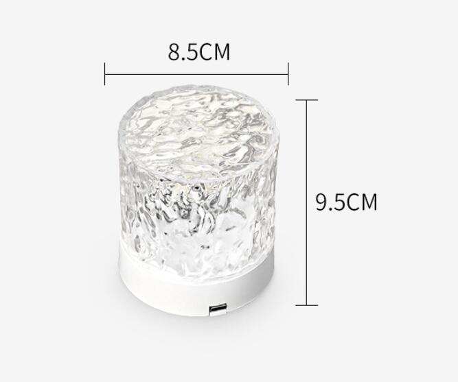 Modern acrylic water ripple night light with tricolor projection and remote control features. 