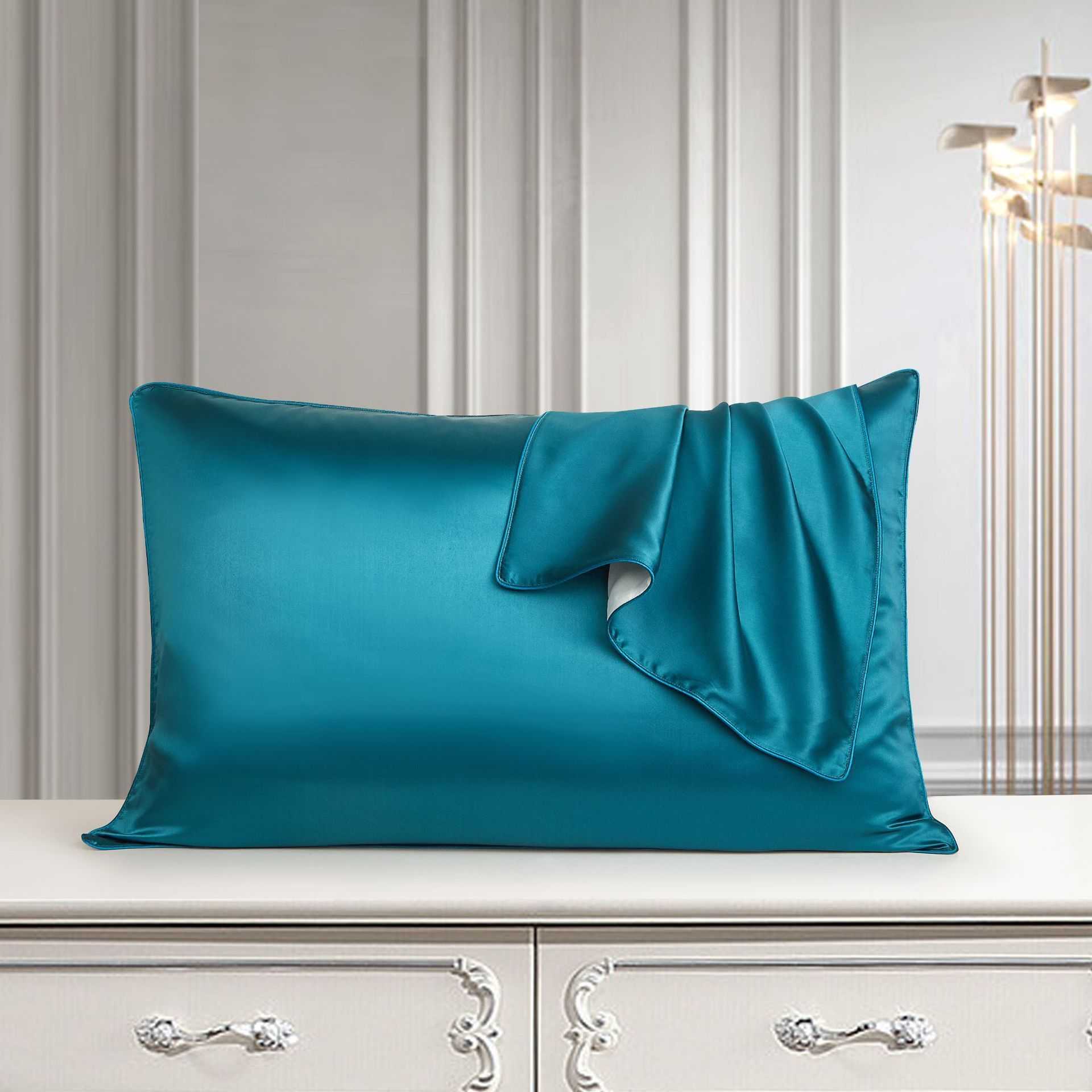 Luxury palace-style mulberry silk pillowcase on elegant dresser.