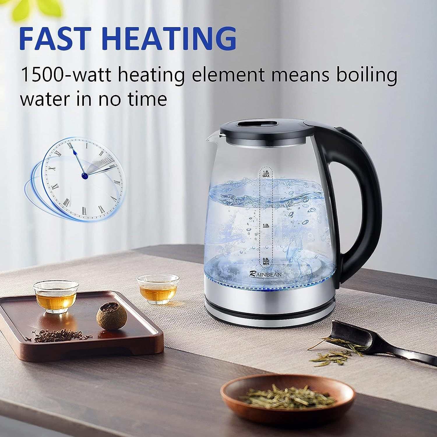Electric kettle with LED light, glass design, 1.8L capacity, on kitchen table.