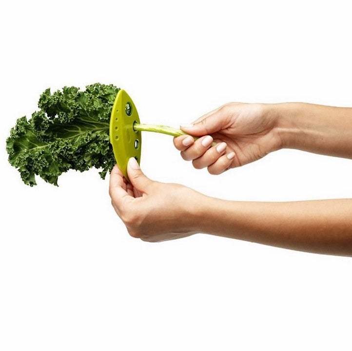 Herb stripper leaf tool removing kale leaves easily.