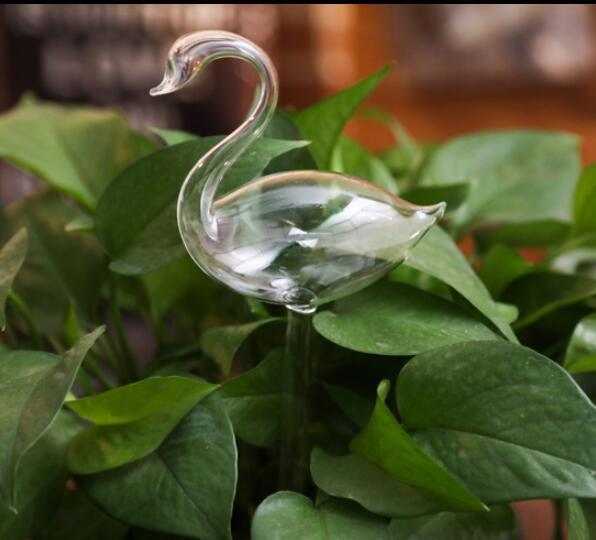 Glass Swan Automatic Watering Device in Green Plant
