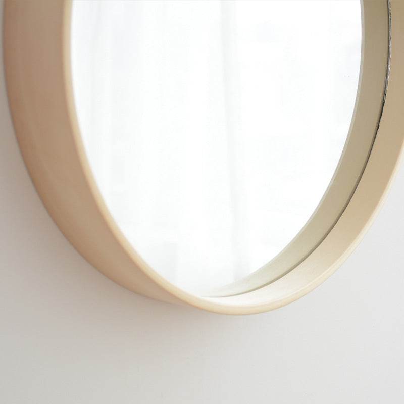 Round solid wood bathroom mirror with original wood color and float silver finish, modern style.