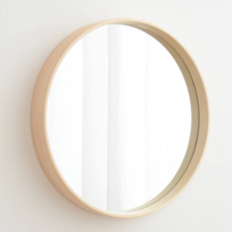 Round solid wood bathroom mirror with original wood color and modern design.