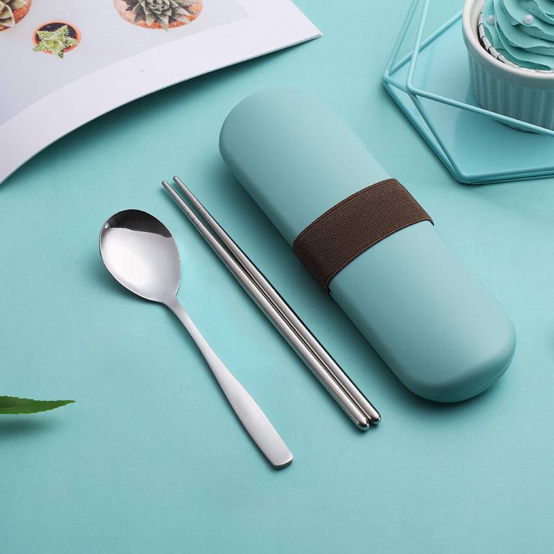 Stainless steel portable cutlery set with case on blue background.