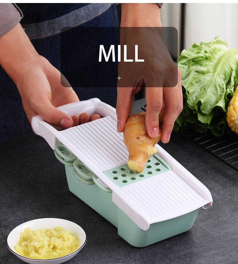 Multifunctional kitchen utensil for grating ginger, eco-friendly design, plastic material, green and pink colors.
