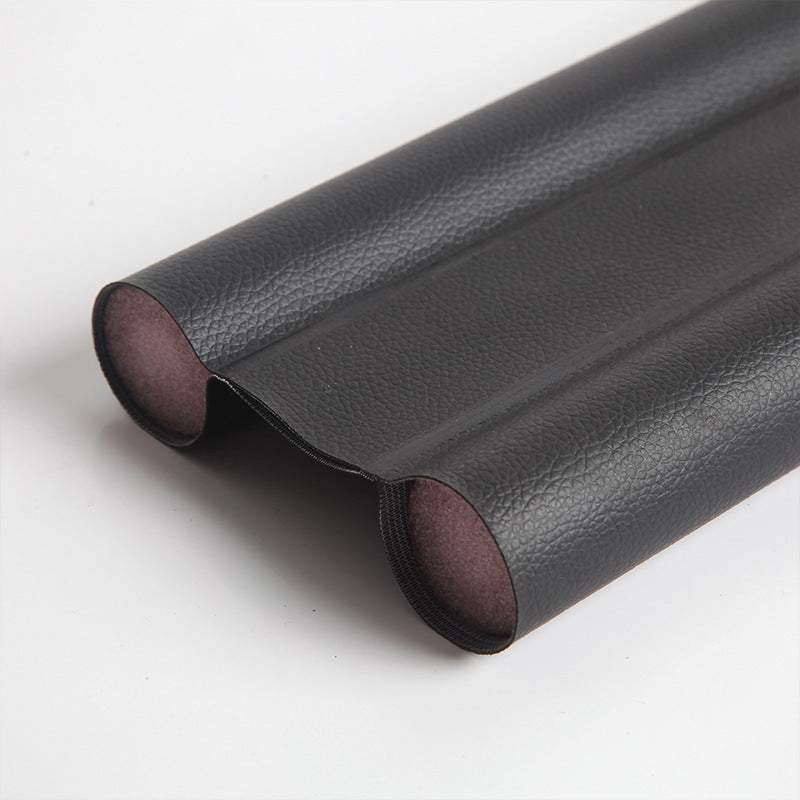 Black door bottom sealing strip, wear and corrosion resistant, for sealing door gaps. 