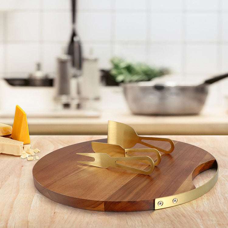 4-piece cheese knife and board set with acacia wood round board and stainless steel knives.