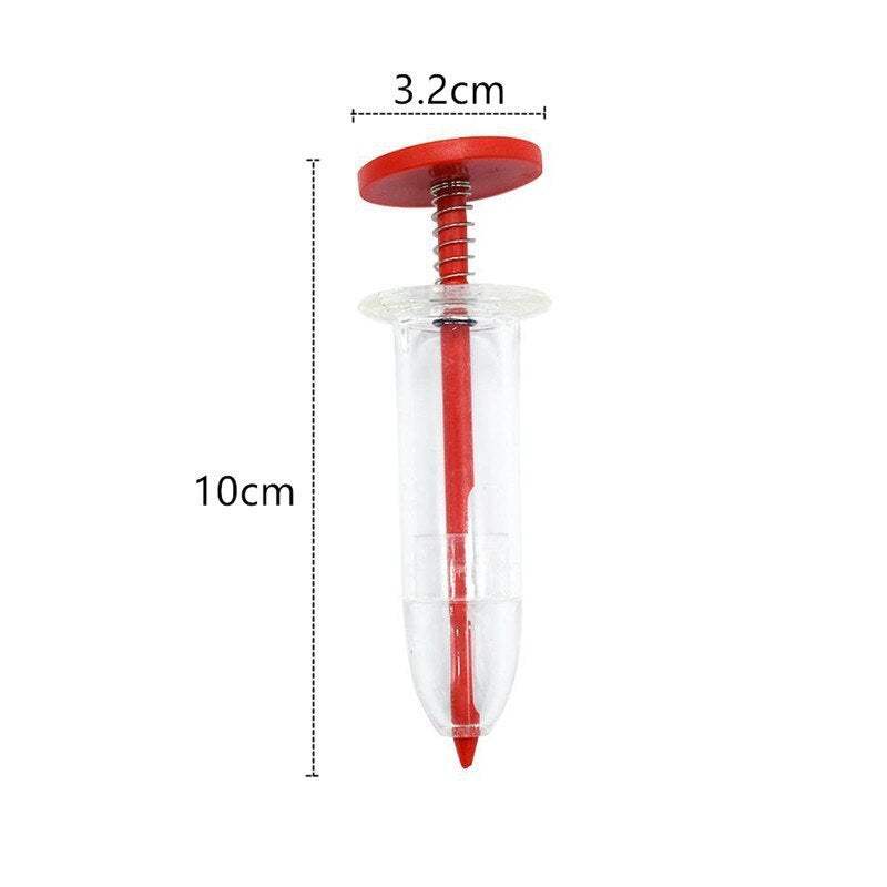 Plastic mini seed dispenser garden tool with red top, transparent body, and dimensions 10cm by 3.2cm.